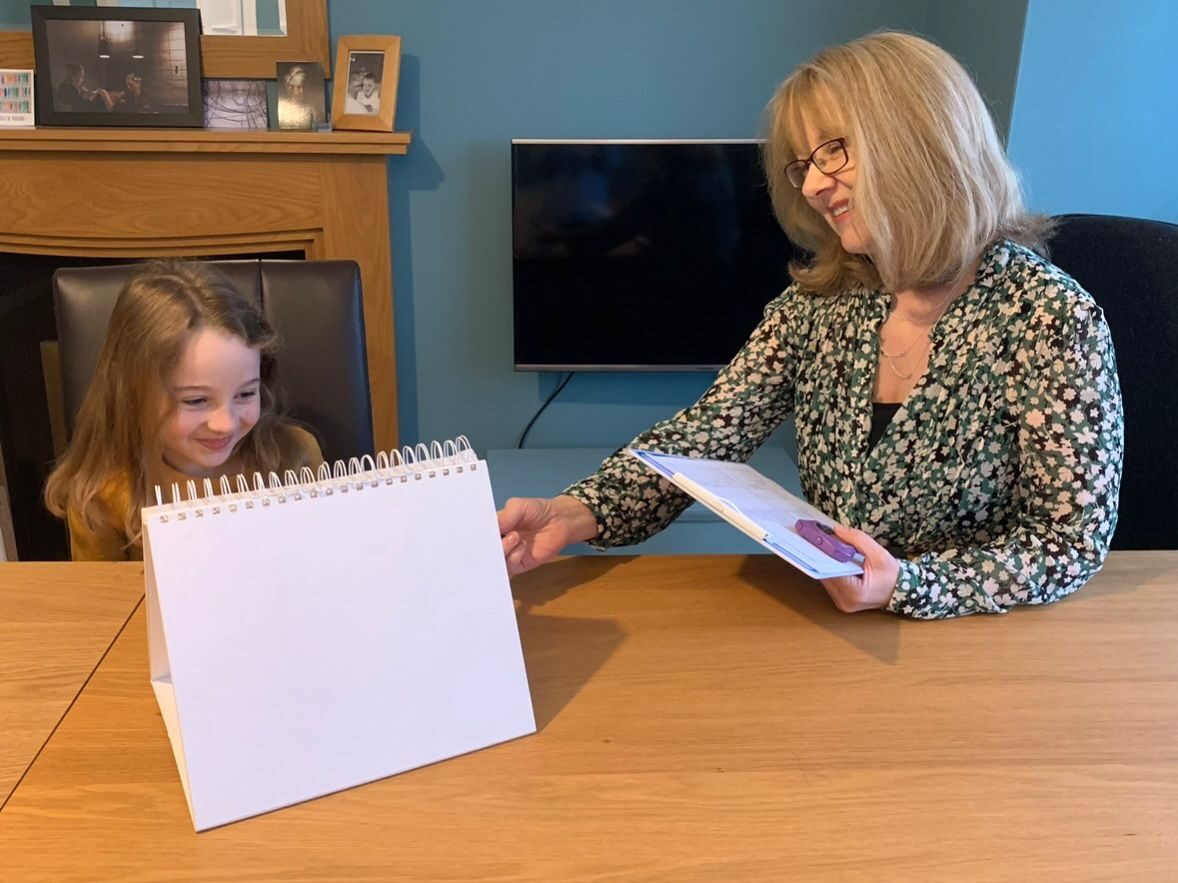 Christine with a client during an assessment session
